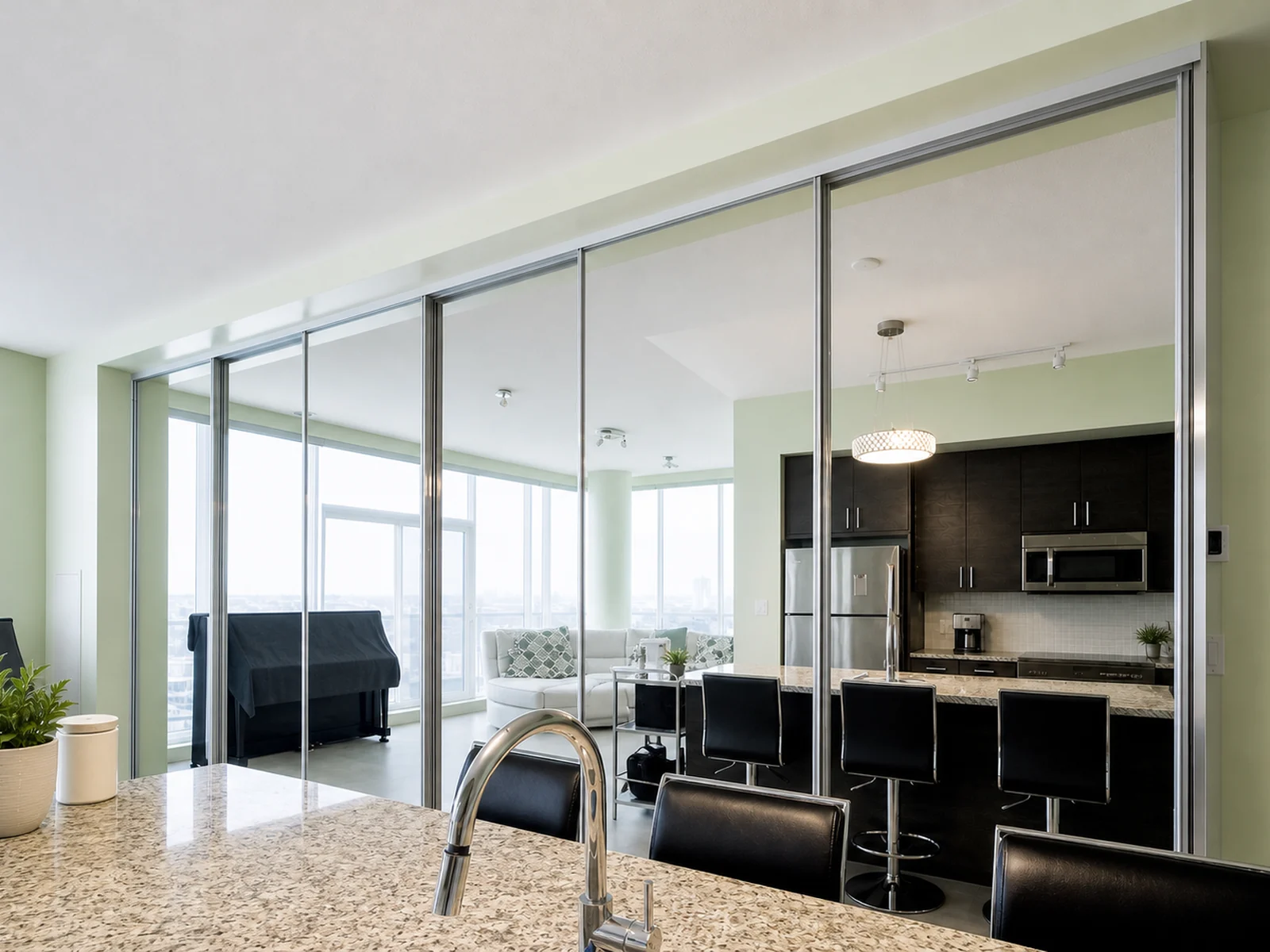 Six mirrored sliding doors installed across a full wall storage opening.