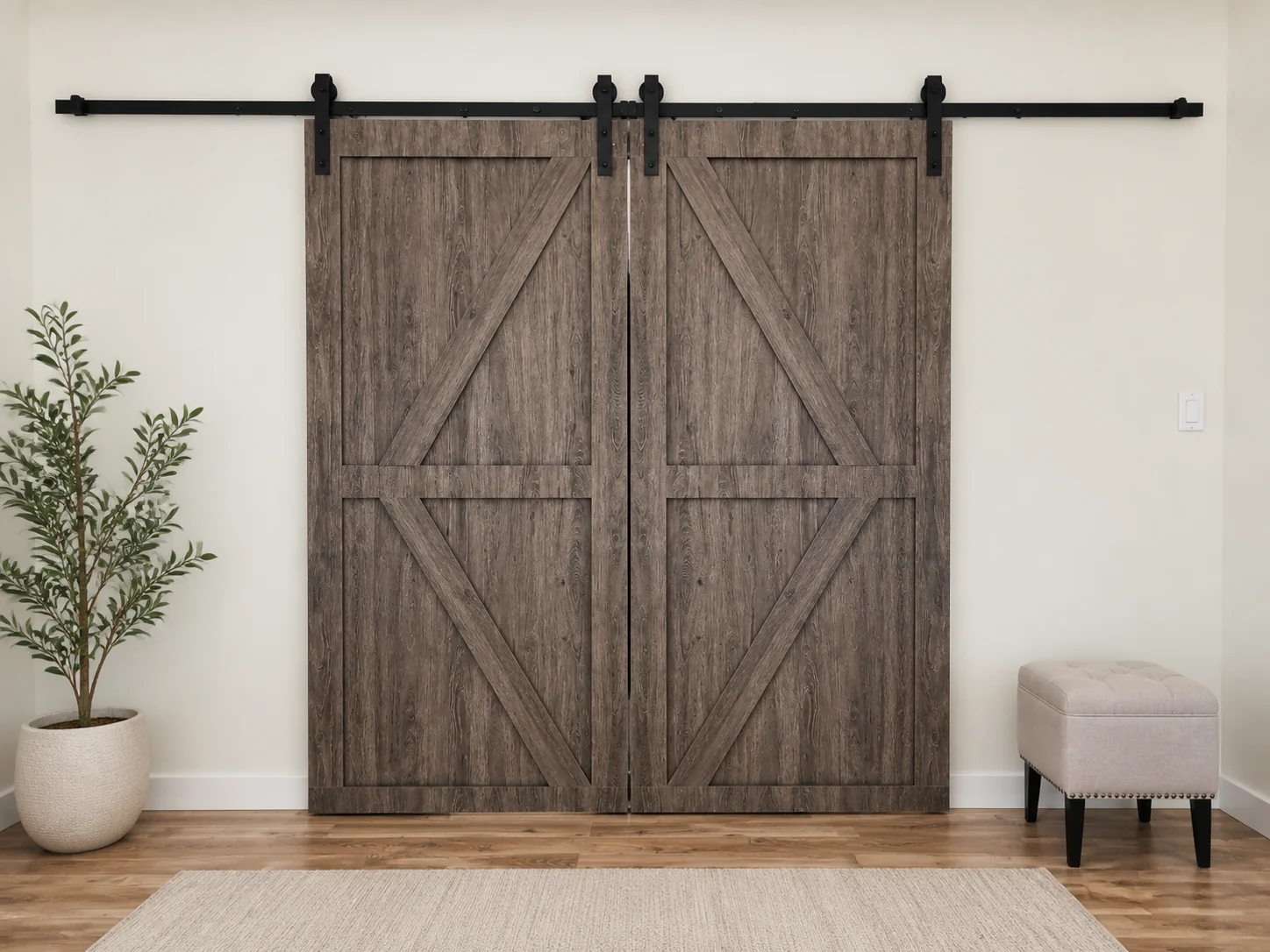 Matching dark wood barn-style sliding doors with layered panels, diagonal trim, and a complete exposed black rail.
